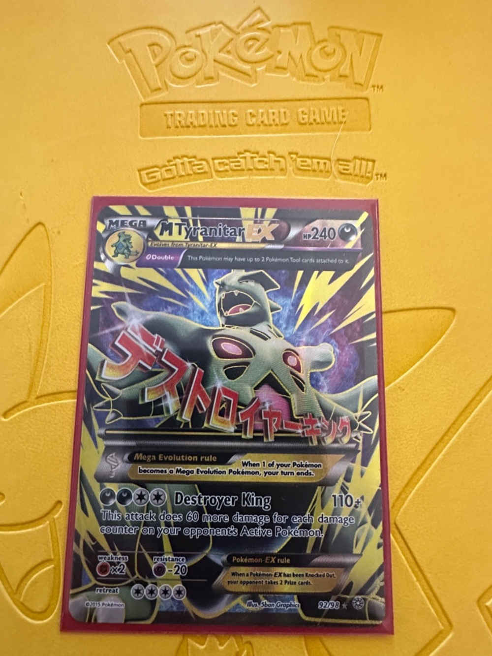 Pokémon MEGA M Tyranitar-EX Holographic Card - Dark/Yellow Accents